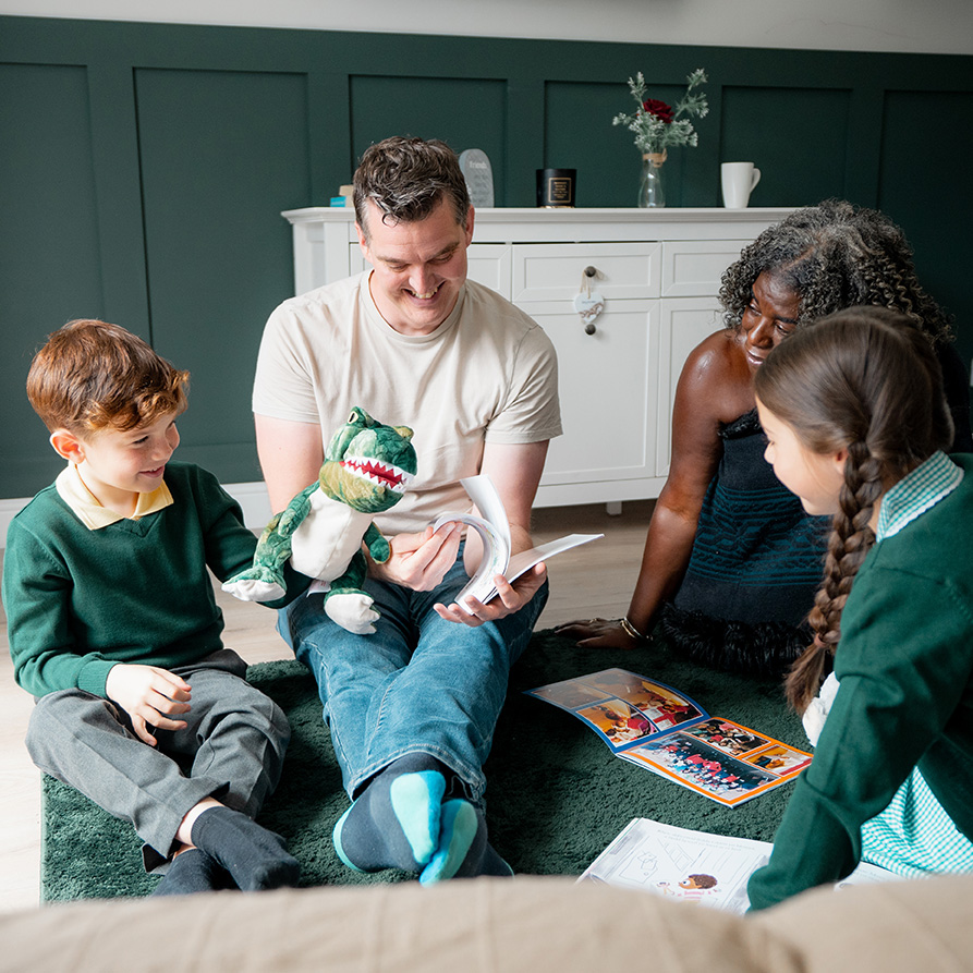 A family reading stories with toys